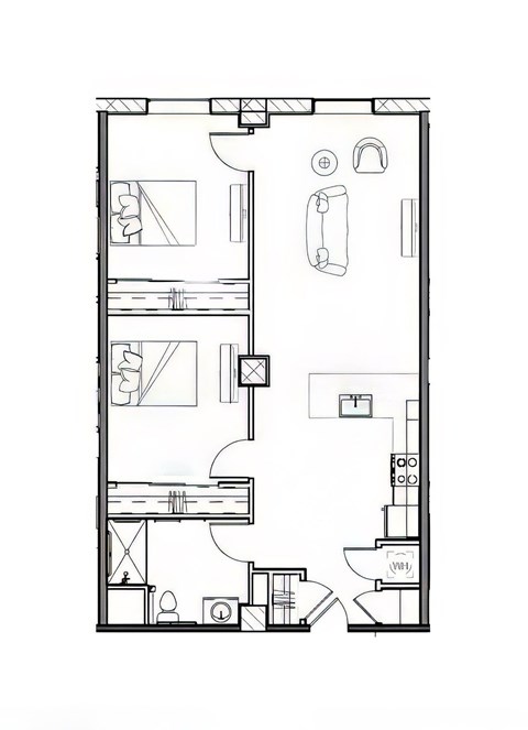 A floor plan of a small apartment with a kitchen, living room, and bathroom.